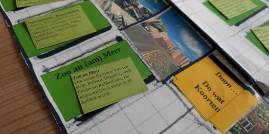 Würfelspiel auf Papier mit Bremer Orten