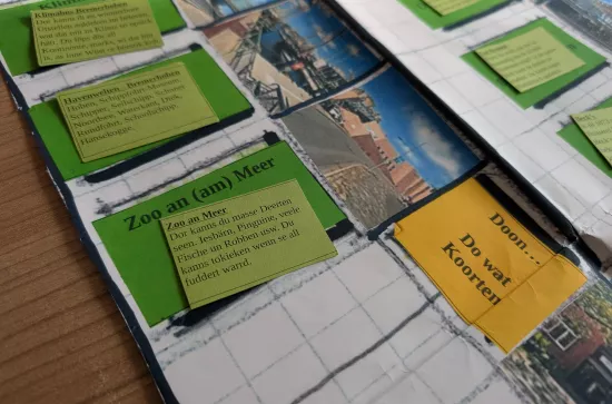 Würfelspiel auf Papier mit Bremer Orten